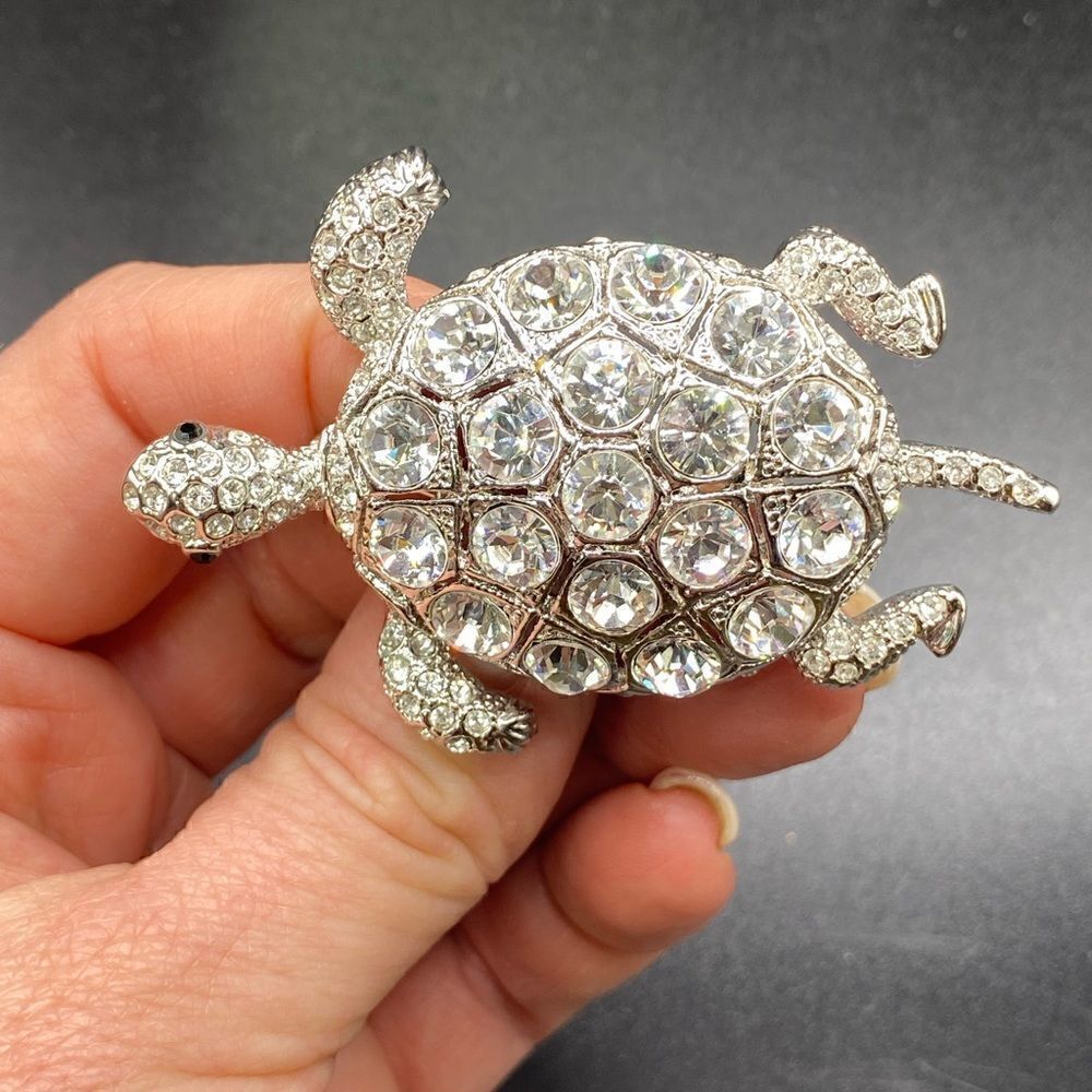 Princess Amanda Borghese (HSN) silvertone rhinestone turtle pin with black eyes